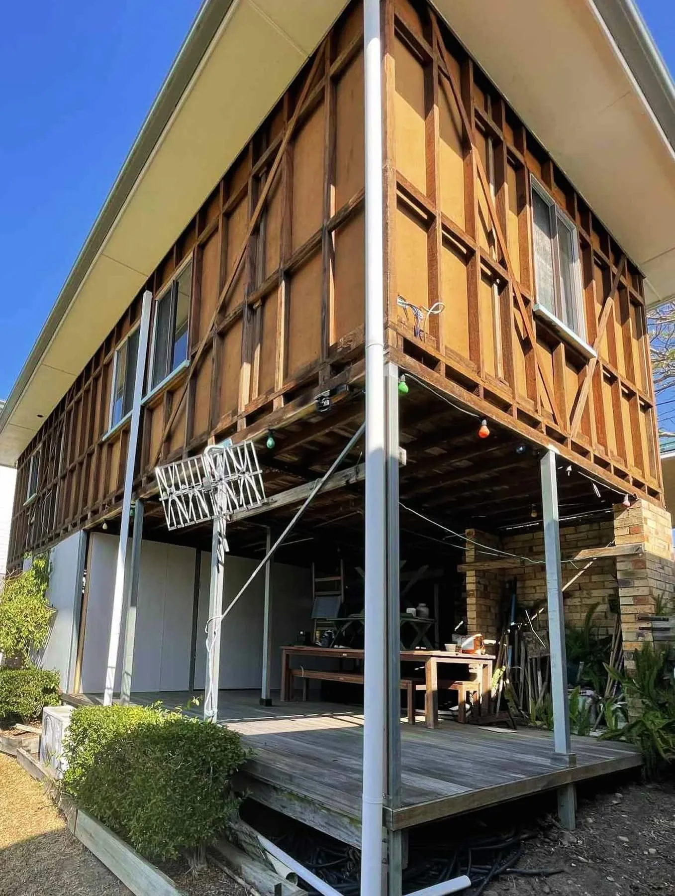 Demolition contractor at work on a Gold Coast house