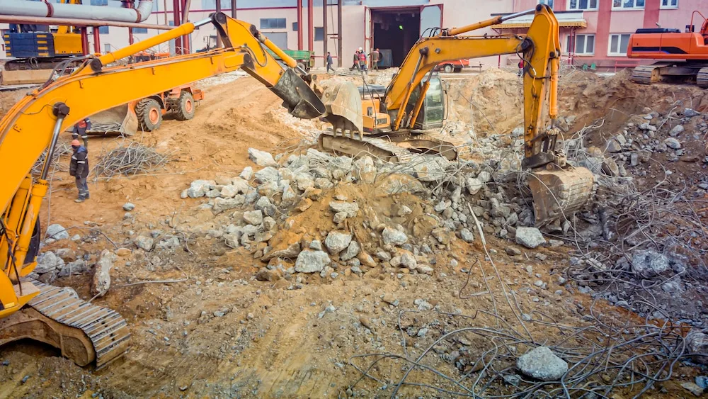 Industrial-scale demolition equipment on site