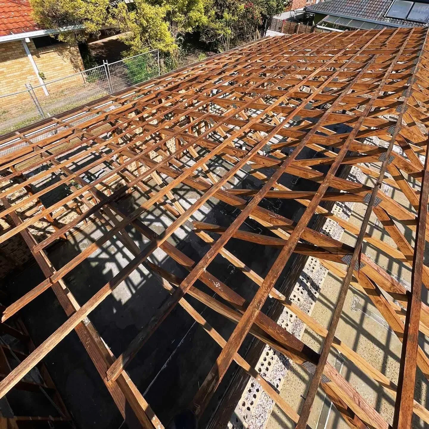 Roof being removed from a Gold Coast property