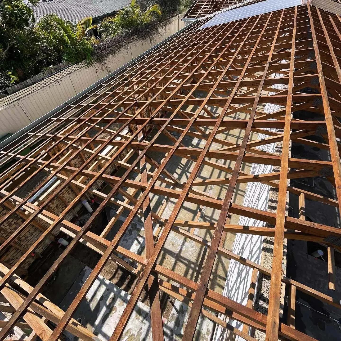 Roof removal on a residential demolition site